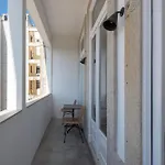 Апартаменты Modern Charming Loft With Balcony In By Lisbeyond *